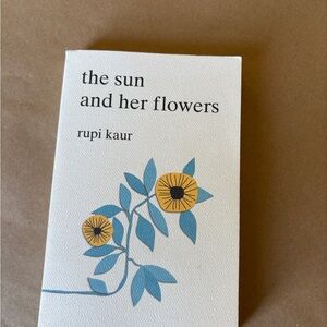 The Sun and Her Flowers Book